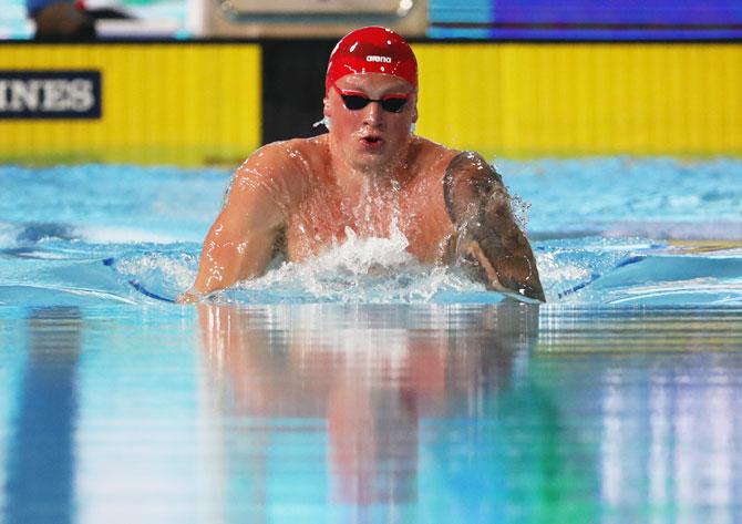 England's Adam Peaty in action in the men's 100m breaststroke final at Optus Aquatic Centre on Saturday