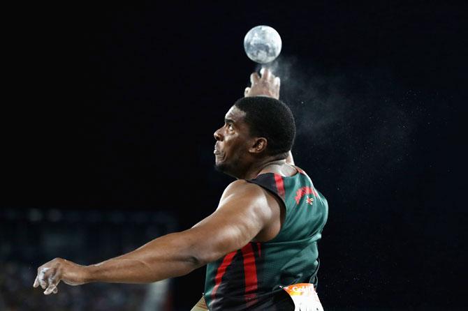 Dominica's Dillon Simon competes in the men's shot put final at Carrara Stadium on Monday