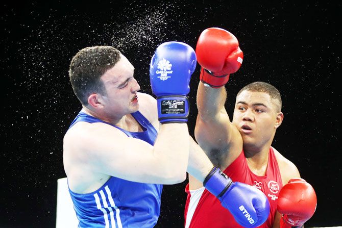 New Zealand's Patrick Malta and Northern Ireland's Stephen McMonagle compete during the men's 91kg boxing quarter-final at Oxenford Studios on Tuesday