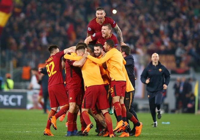 Roma's players celebrate