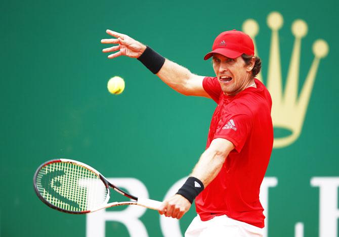 Germany's Mischa Zverev plays a backhand shot during the Round of 64 match against Felix Auger-Aliassime at the ATP Masters Series: Monte Carlo Rolex Master at Monte-Carlo Sporting Club in Monte-Carlo, Monaco, on Sunday