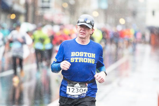 Marathon runner Les Regehr approaches the 24 mile marker of the 2018 Boston Marathon