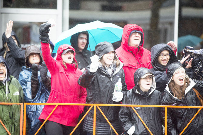 Spectators cheer the elite runners during the 2018 Boston Marathon as they pass on