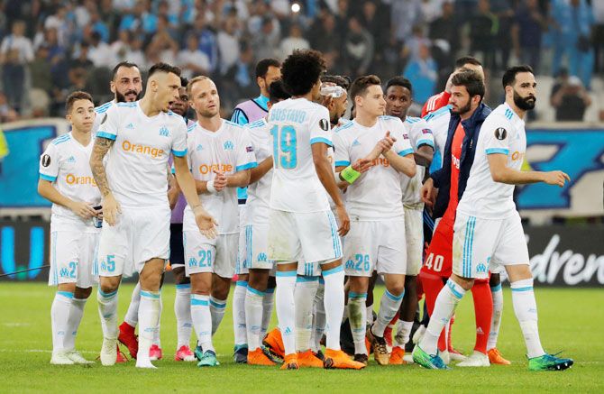 Marseille players celebrate after their Europa League Semi Final First Leg match against RB Salzburg at the Orange Velodrome, Marseille, France on Thursday