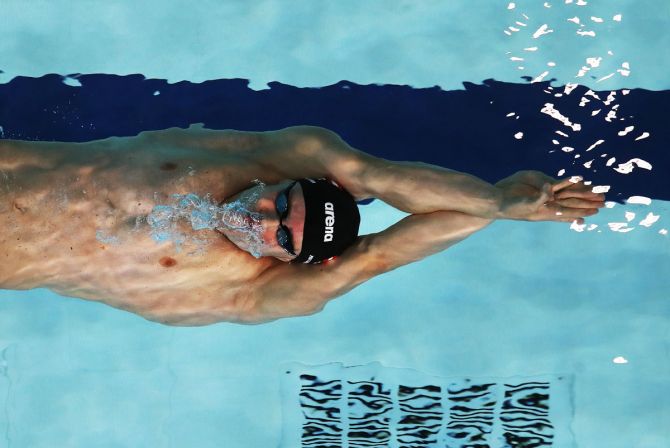 Austria's Bernhard Reitshammer competes during the Men's 100m Backstroke heats at Tollcross International Swimming Centre in Glasgow on August 5