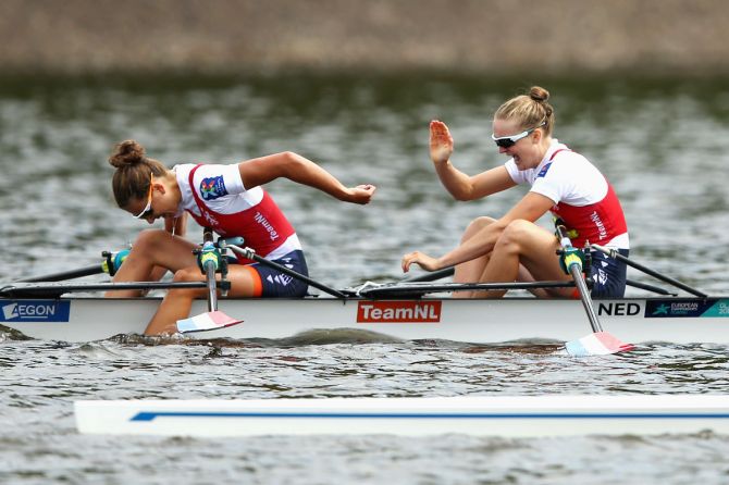 Marieke Keijser and Ilse Paulis of Netherlands celebrate winning in the rowing final of the Lightweight Women's Double Sculls event at Strathclyde Country Park in Glasgow on August 5