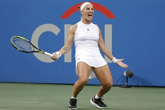 Russia's Svetlana Kuznetsova celebrates match point to beat Croatia's Donna Vekic and win the women's singles final in the Citi Open at Rock Creek Park Tennis Center in Washington on Sunday