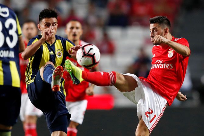 Benfica's Pizzi in action with Fenerbahce's Elif Elmas during their Champions League, third qualifying round first leg match at Estadio da Luz, Lisbon, Portugal on Tuesday