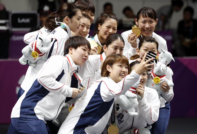 Asian Games: Japan beat rivals China for first badminton ...