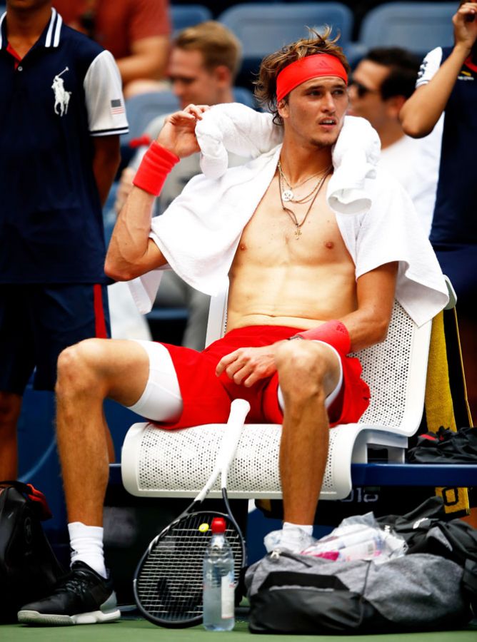 Germany's Alexander Zverev cools off during his singles first round match against Canada's Peter Polansky on Tuesday