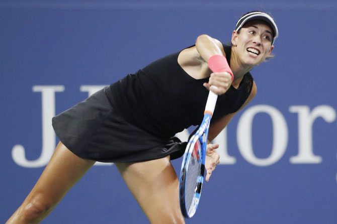 Spain's Garbine Muguruza serves against Czech Republic's Karolina Muchova in the second round match of the US Open tennis tournament at USTA Billie Jean King National Tennis Center on Wednesday