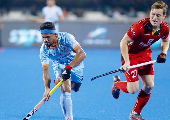 Action from the match hockey World Cup Pool C match between India and Belgium in Bhubaneswar on Sunday