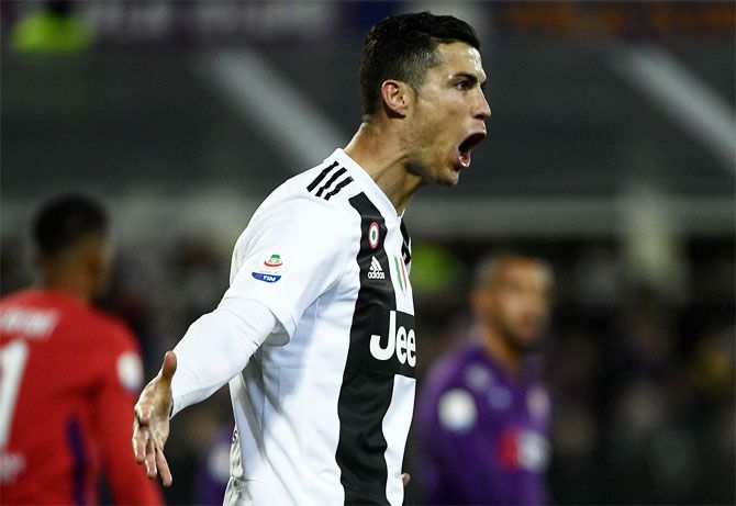 Juventus FC's Cristiano Ronaldo celebrates after scoring against Fiorentina on Saturday