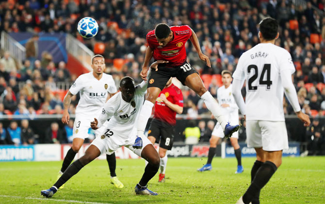 Manchester United's Marcus Rashford scores their first goal against Valencia at Mestalla Stadium in Valencia on Wednesday