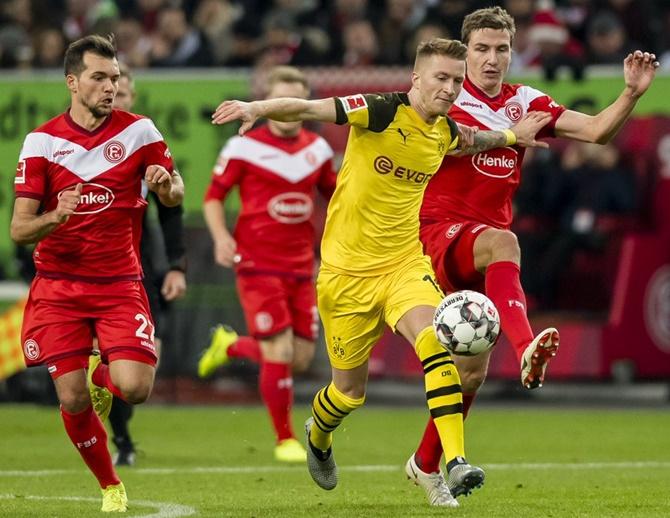 Football Extras: Dortmund stunned; PSG progress in Cup - Rediff Sports