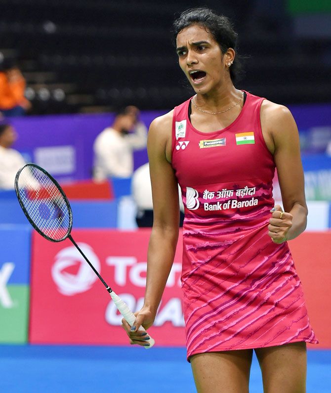 India badminton player PV Sindhu celebrates a point against Spanish shuttler Beatriz Corrales during their women's singles quarter-final of the India Open at Siri Fort Indoor Stadium in New Delhi on Friday