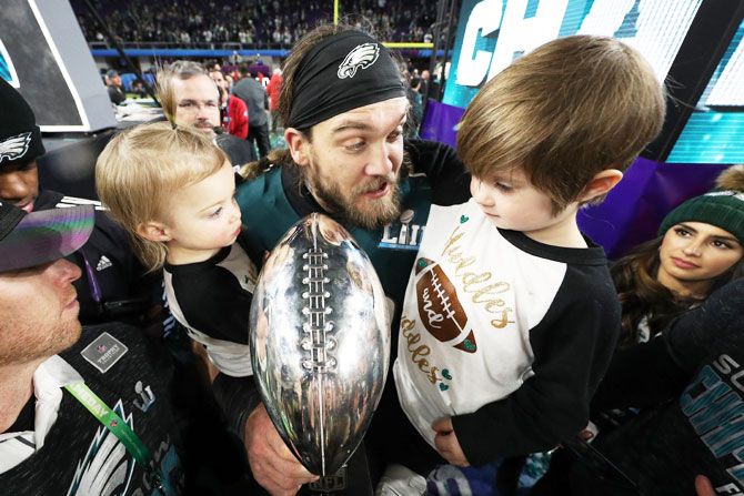 Bryan Braman #50 of the Philadelphia Eagles celebrates with his kids