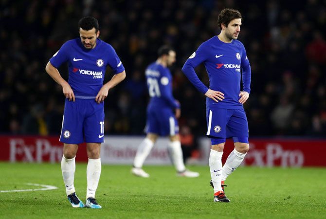 Chelsea's Cesc Fabregas and Pedro wear a dejected look during their Premier League match against Watford at Vicarage Road in Watford on Tuesday