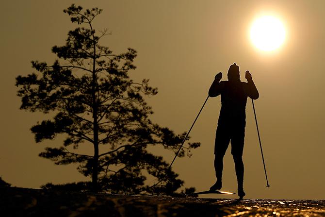 A Biathlete trains ahead of the Pyeongchang 2018 Winter Olympic Games at Alpensia Biatyhlon Centre on Thursday