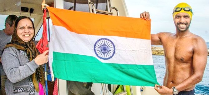 Pune-based Rohan More holds up the tri-colour on completing his feat