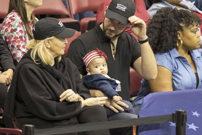 Serena Williams's husband Aleixis Ohanian (right) with their daughter Alexis Olympia Ohanian Jr at the Fed Cup match on Sunday