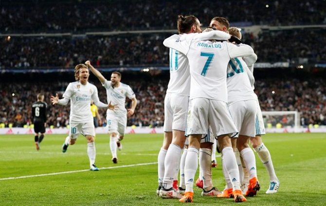 Marcelo is congratulated by his Real Madrid teammates after scoring