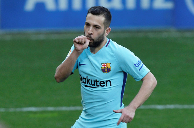 Barcelona’s Jordi Alba celebrates scoring their second goal against Eibar during their La Liga match on Saturday