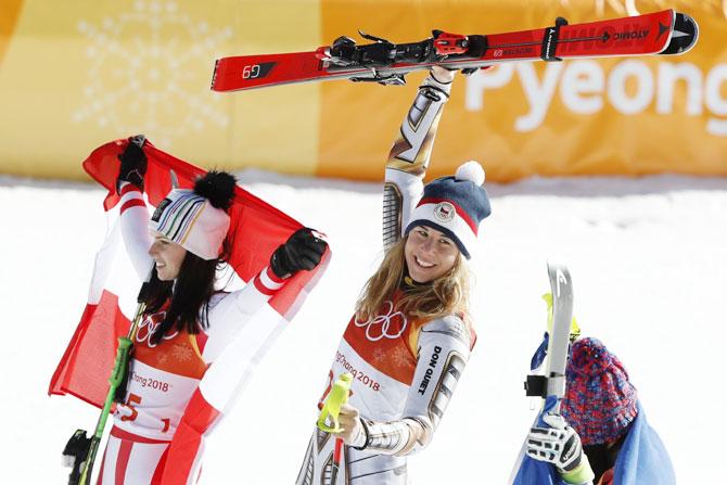 Super-G alpine skiers Anna Veith of Austria, Ester Ledecka of Czech Republic, and Tina Weirather of Liechtenstein react during the victory ceremony at the Jeongseon Alpine Centre in Pyeongchang on Saturday