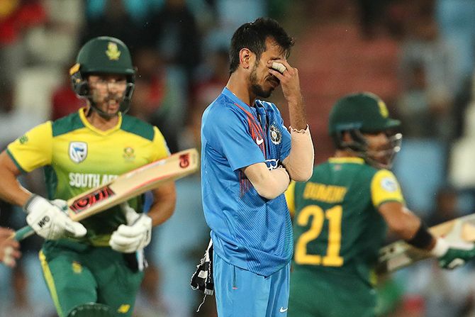 Yuzvendra Chahal cuts a frustrated figure after dropping a return catch off Behardien's bat