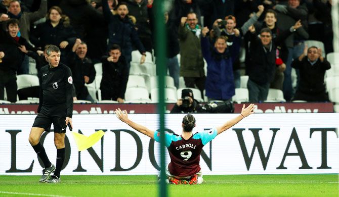 West Ham United's Andy Carroll celebrates scoring their second goal against West Brom
