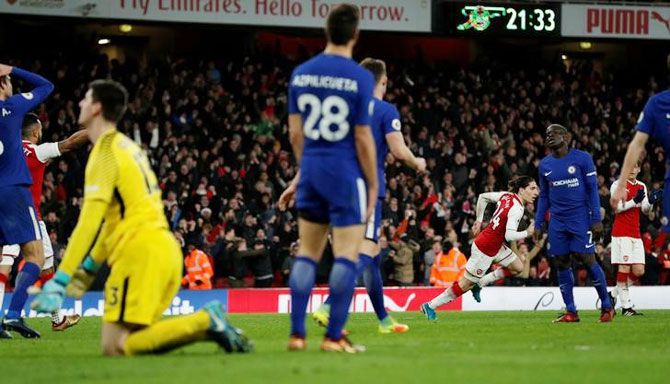 Arsenal's Hector Bellerin celebrates scoring their second goal