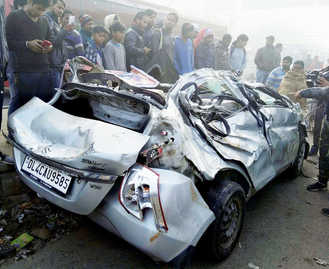 The mangled remains of the car that was ferrying the six powerlifting athletes