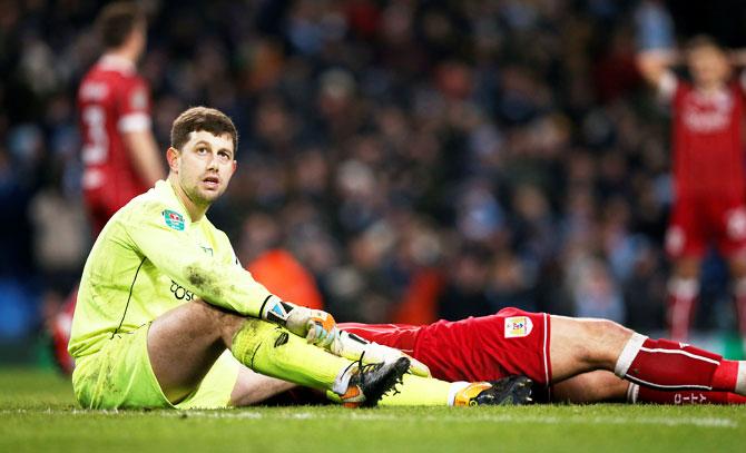 Bristol City's Frank Fielding looks dejected after Manchester City scored the winner