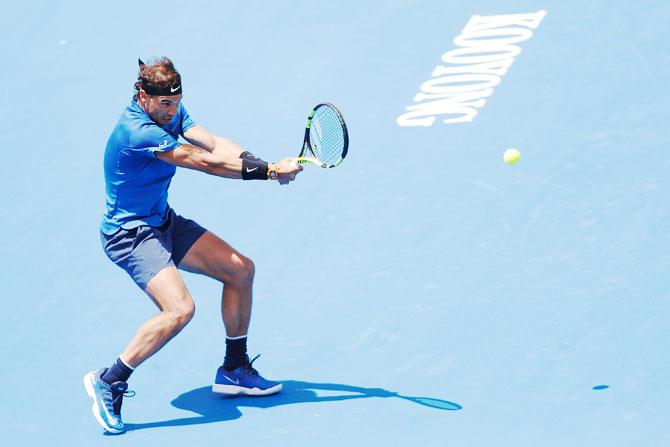 Spain's Rafael Nadal hits a backhand during his match against Richard Gasquet in the 2018 Kooyong Classic at Kooyong in Melbourne on Tuesday