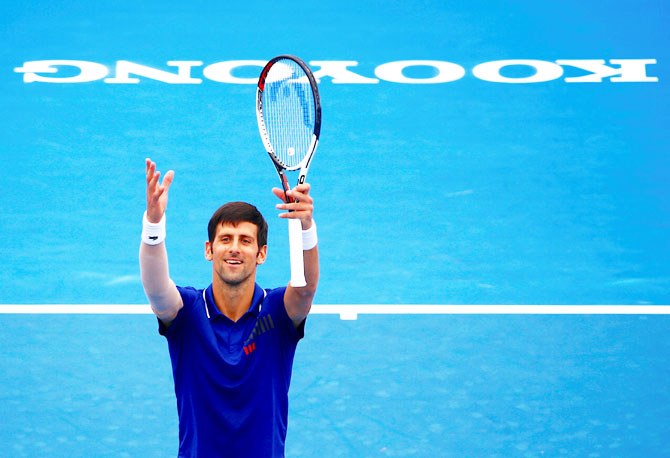 Serbia's Novak Djokovic celebrates after defeating Austria's Dominic Thiem