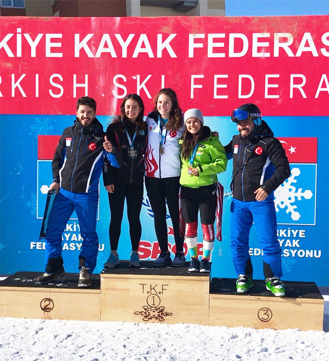 India's Aanchal Thakur (right) poses with her medal on the podium