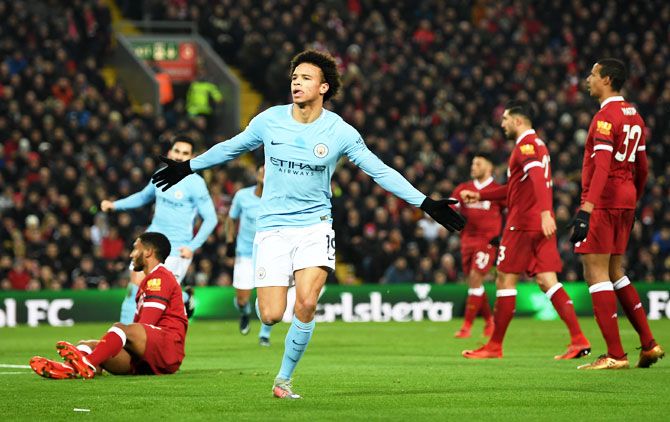 Manchester City's Leroy Sane celebrates after scoring their first goal