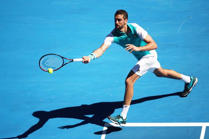 Croatia's Marin Cilic plays a forehand in his second round match against Portugal's Joao Sousa