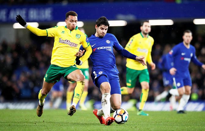 Chelsea’s Alvaro Morata and Norwich City's Josh Murphy vie for the ball during their FA Cup third round replay at Stamford Bridge on Wednesday