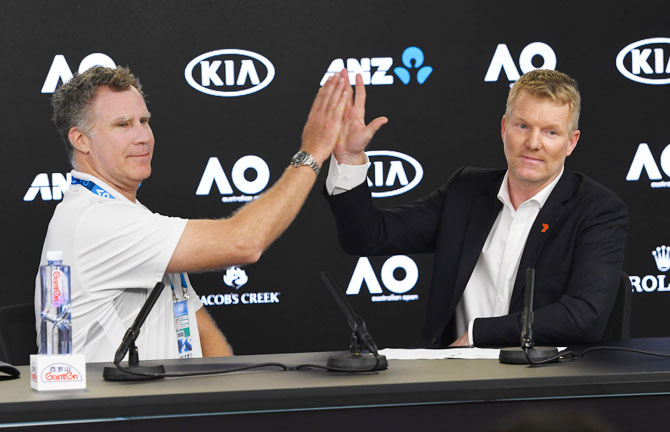 Hollywood actor Will Ferrell and former US tennis star Jim Courier joke about during a press conference at the Australian Open at Melbourne Park on Thursday