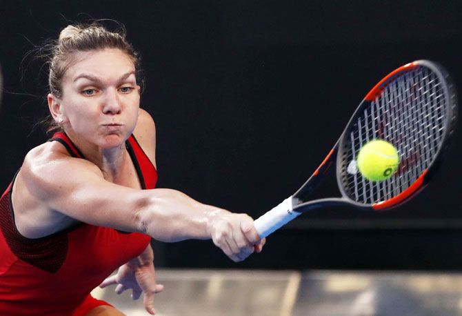 Romania's Simona Halep in action during her match against Canada's Eugenie Bouchard