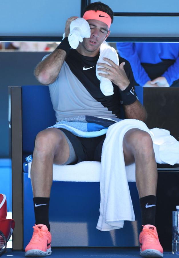 Argentina's Juan Martin Del Potro cools off between games in his second round match against Russia's Karen Khachanov