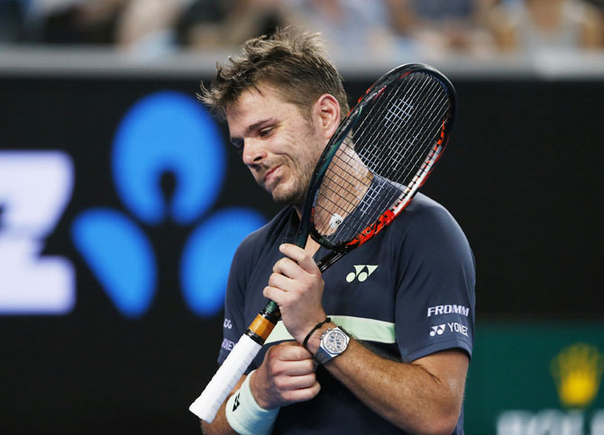 Switzerland's Stan Wawrinka reacts during his match against USA's Tennys Sandgren