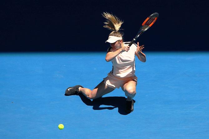 Ukraine's Elina Svitolina plays a forehand during her third round match against compatriot Marta Kostyuk