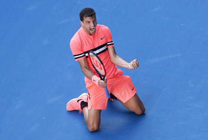 Bulgaria's Grigor Dimitrov celebrates after defeating Russia's Andrey Rublev in their 3rd round match