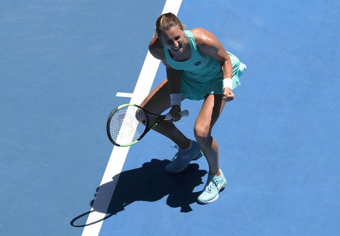 Croatia's Petra Martic celebrates winning against Thailand's Luksika Kumkhum