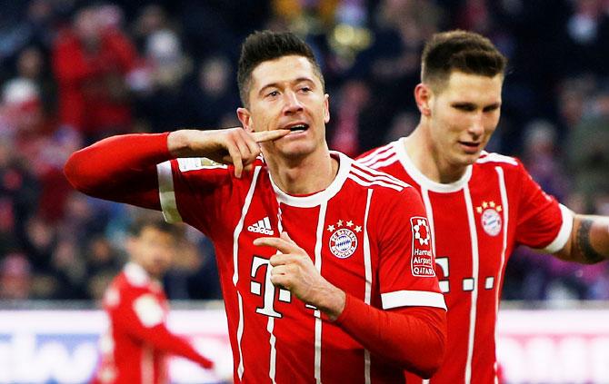 Bayern Munich's Robert Lewandowski celebrates scoring their second goal against Werder Bremen at the Allianz Arena in Munich on Sunday