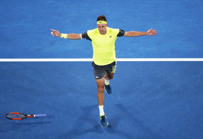 USA's Tennys Sandgren celebrates winning his match against Austria's Dominic Thiem