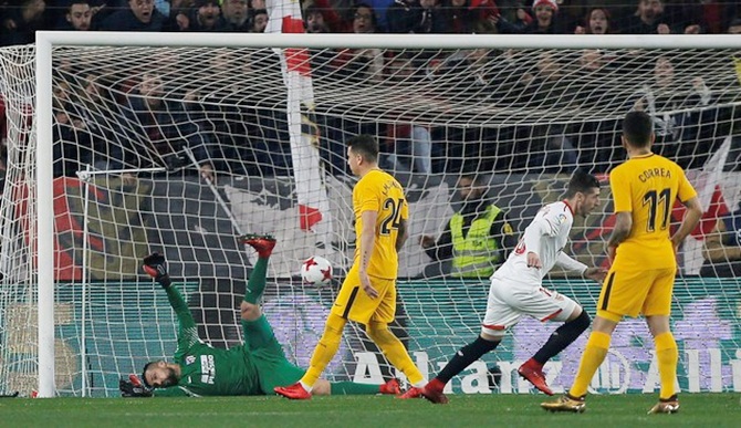 Sergio Escudero celebrates scoring Sevilla’s opening goal