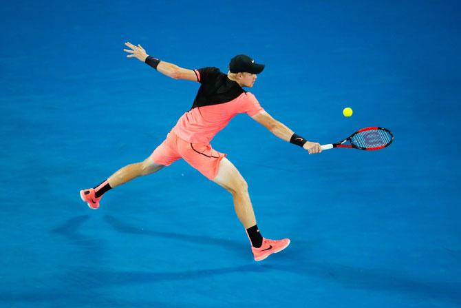 Kyle Edmund plays a backhand return